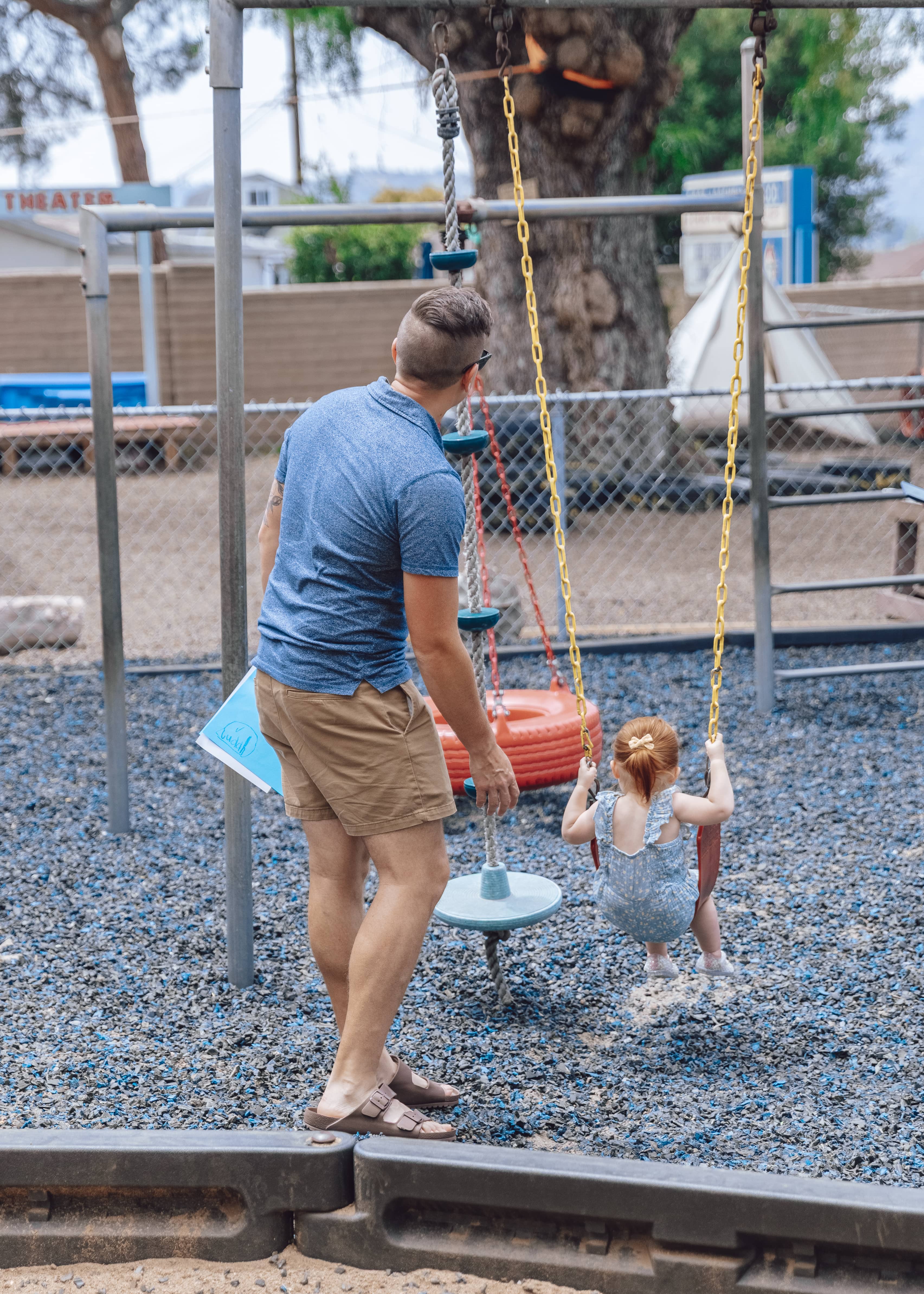 Dad and daughter on the playground
