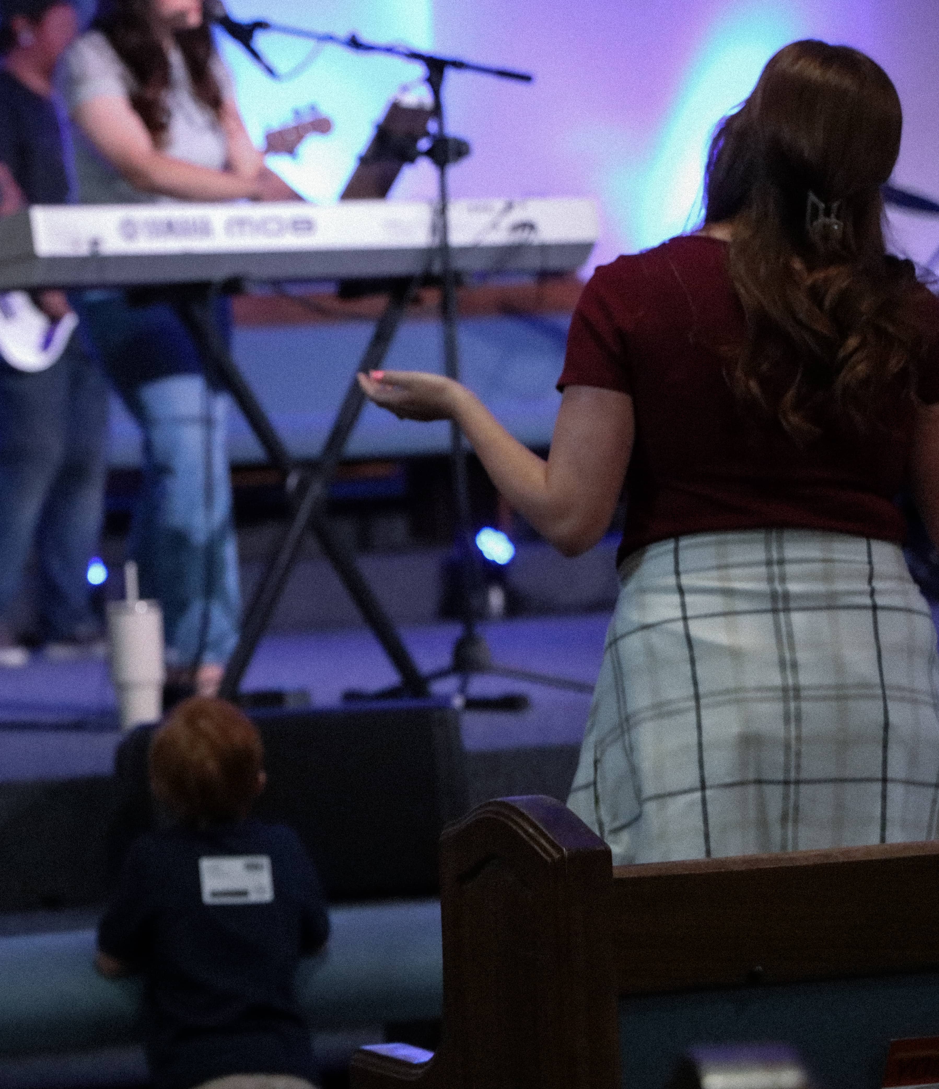 Worship moment with toddler at Hope City