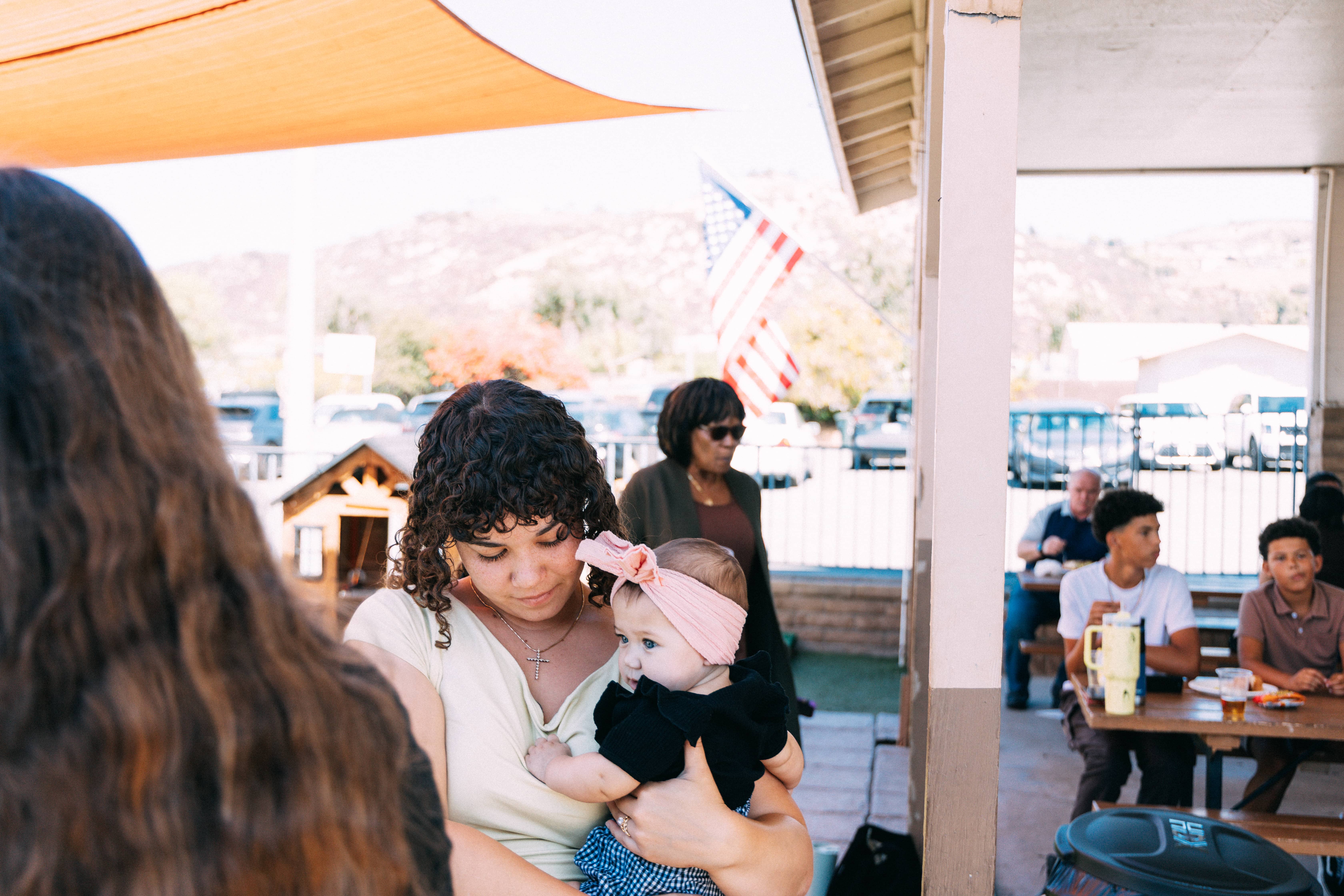 Mom holding baby at Hope City Church